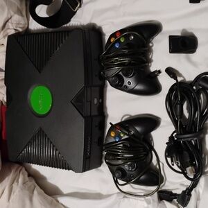 Complete all original Xbox,2controllers,carrying case, disk case